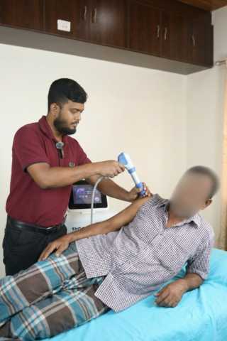 Dr Joshim Uddin With Patient Photo